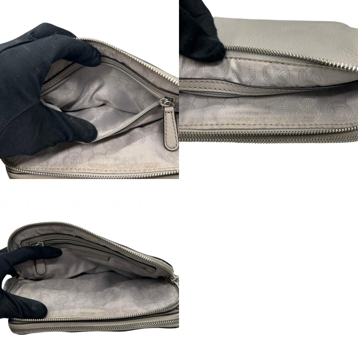 美品 マイケルコース MICHAEL KORS ショルダーバッグ クロスボディ ポシェット 斜め掛け可 レザー 本革 グレー ライトグレー シルバー金具 ロゴ シンプル 軽量 コンパクト レディース お出かけ 旅行 デート サブバッグ s93