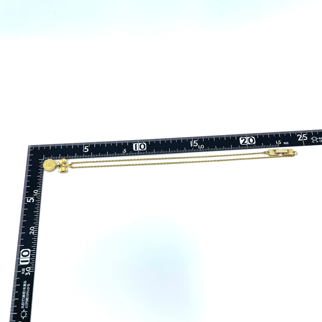 美品 GIVENCHY ジバンシー ネックレス ペンダント リボンモチーフ G4ロゴ ゴールドカラー ヴィンテージ アクセサリー ジュエリー レディース I1
