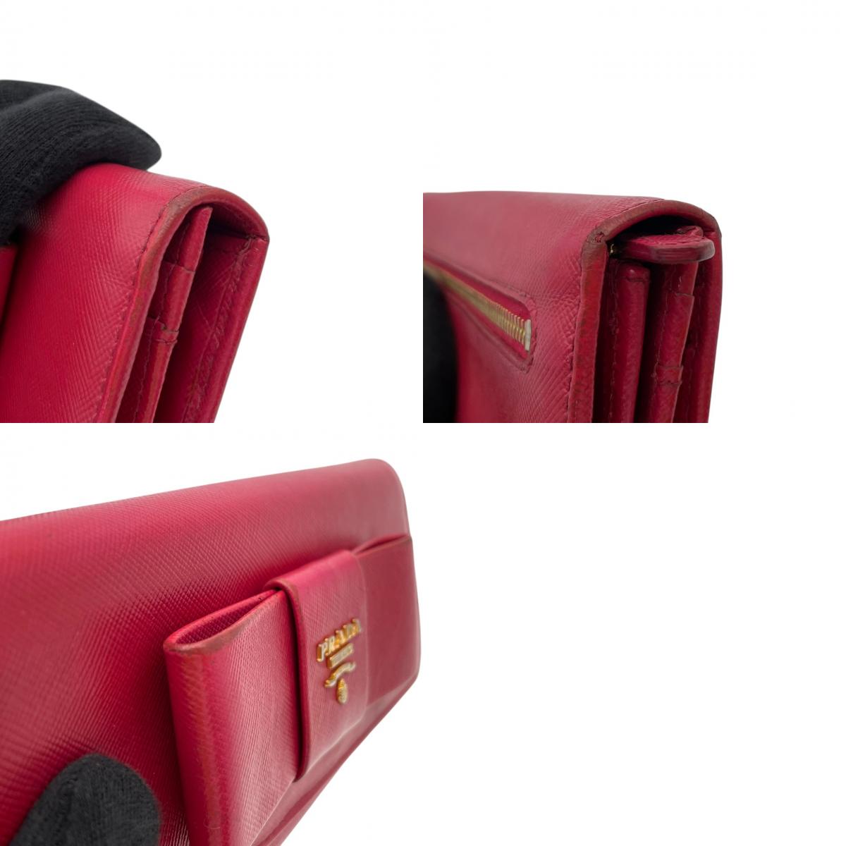 プラダ PRADA サフィアーノ フィオッコ 長財布 レザー 本革 ピンク リボン 1M1132 フラップ 二つ折り ロングウォレット ゴールド金具 ロゴ金具 札入れ 小銭入れ カード収納 レディース 上品 クラシック 日常使い 収納力 M3
