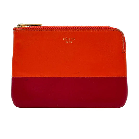 セリーヌ CELINE コインケース レザー 本革 オレンジ ワインレッド バイカラー ジップ 小銭入れ カードケース ゴールド金具 ロゴ刻印 コンパクト ミニウォレット ファスナー開閉 マルチケース レディース 上品 シンプル 日常使い 収納力 M3