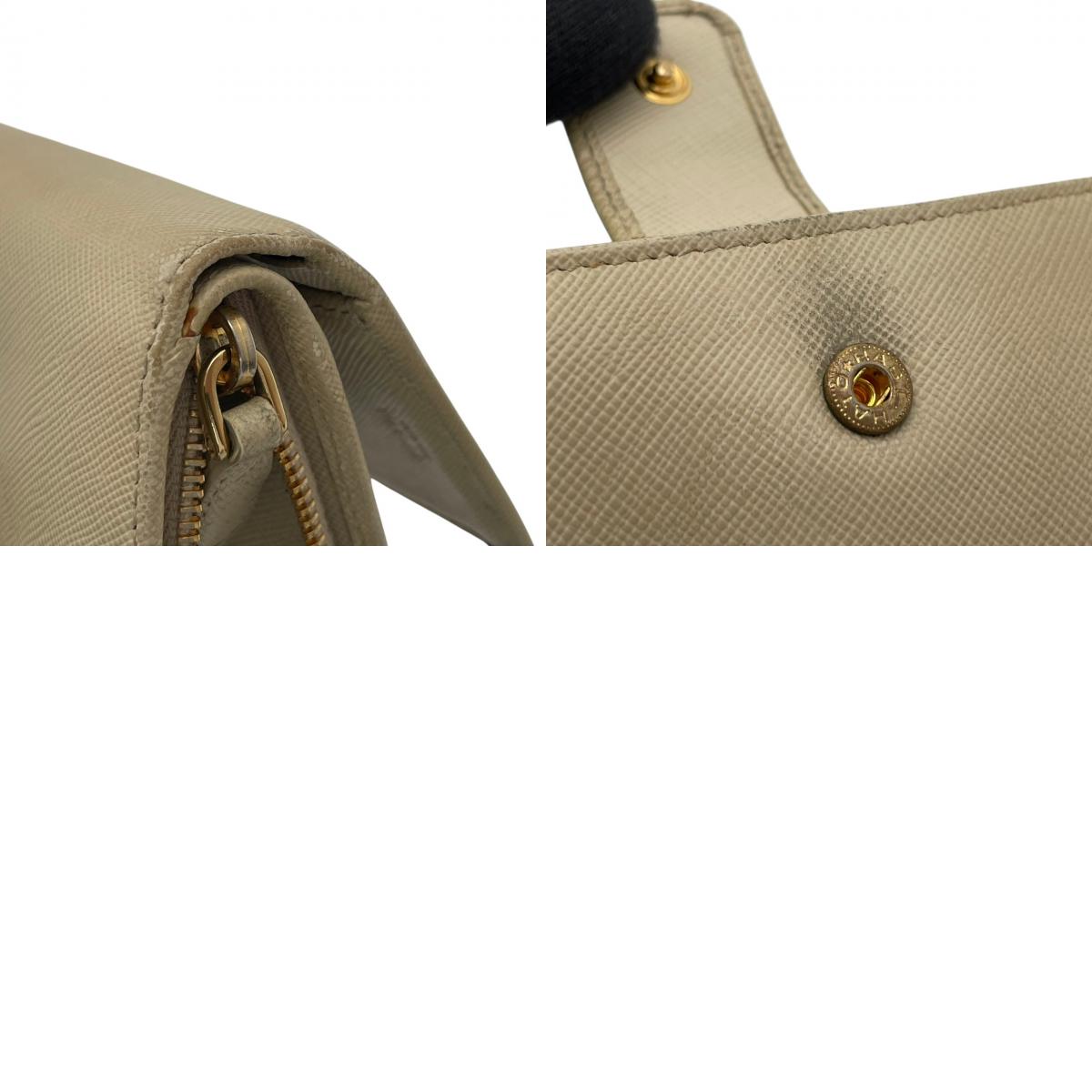 【良品】プラダ サフィアーノ 二つ折り財布 コンパクトウォレット L字ファスナー ベージュ レザー ミニ財布 レディース 人気 定番 ブランド ビジネス カジュアル エレガント 上品 高級感 大人可愛い おしゃれ 贈り物 ギフト プレゼント お出かけ W4