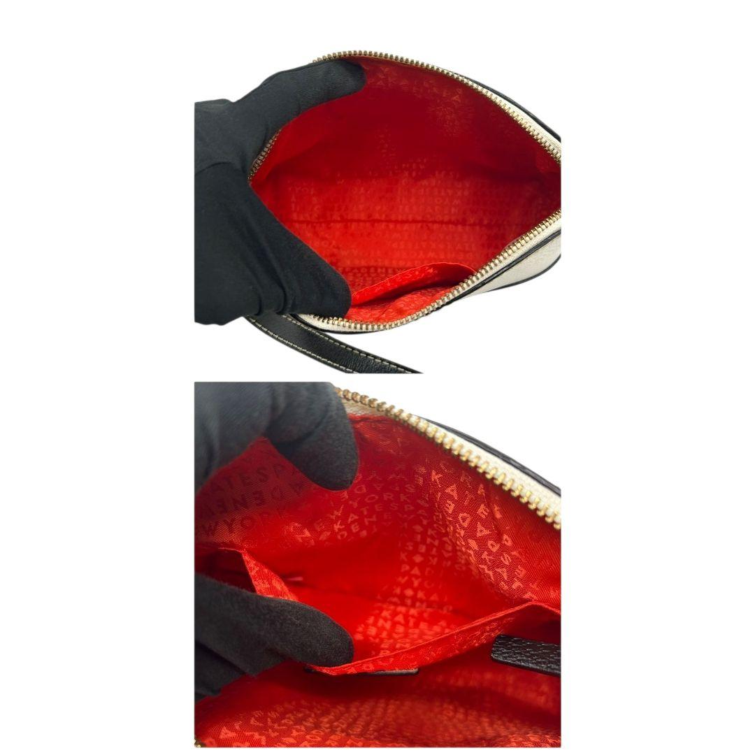 ケイトスペード ショルダーバッグ 黒 白 バイカラー ドーム型 斜め掛け可 自立可 PVC ロゴプレート シルバー金具 ブラック ホワイト kate spade 上品 おしゃれ 通勤 通学