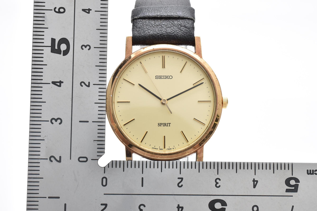 SEIKO セイコー Spirit スピリット 7N01-7060 メンズ クォーツ 腕時計 クリーム文字盤 2針 ゴールドカラー ステンレス ブラック レザーストラップ 31mm 1990年代 ヴィンテージ