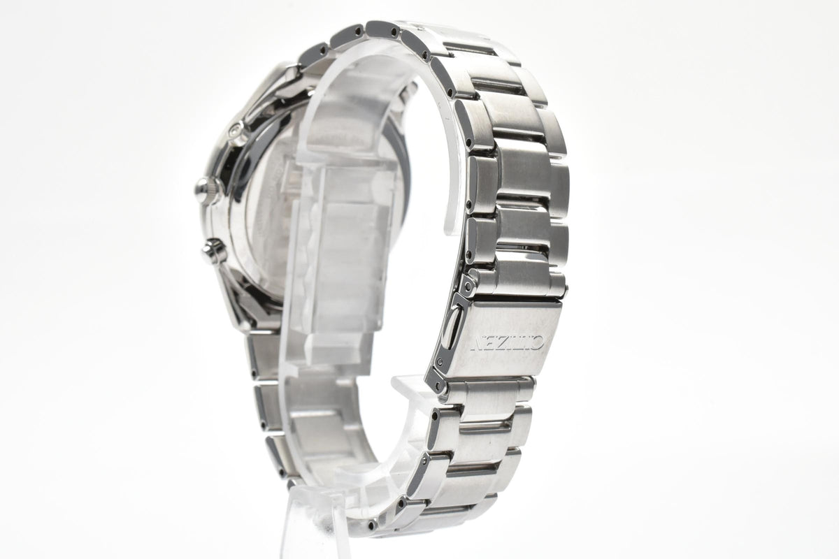 CITIZEN シチズン コレクション H415-S112907 メンズ エコドライブ 電波ソーラー 腕時計 ブラック文字盤 ローマ数字 デイト ステンレス ブレスレット 36.6mm 2010年代
