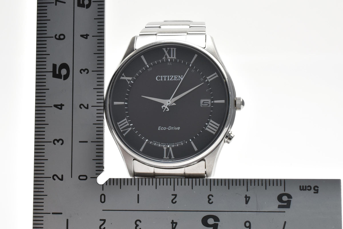 CITIZEN シチズン コレクション H415-S112907 メンズ エコドライブ 電波ソーラー 腕時計 ブラック文字盤 ローマ数字 デイト ステンレス ブレスレット 36.6mm 2010年代