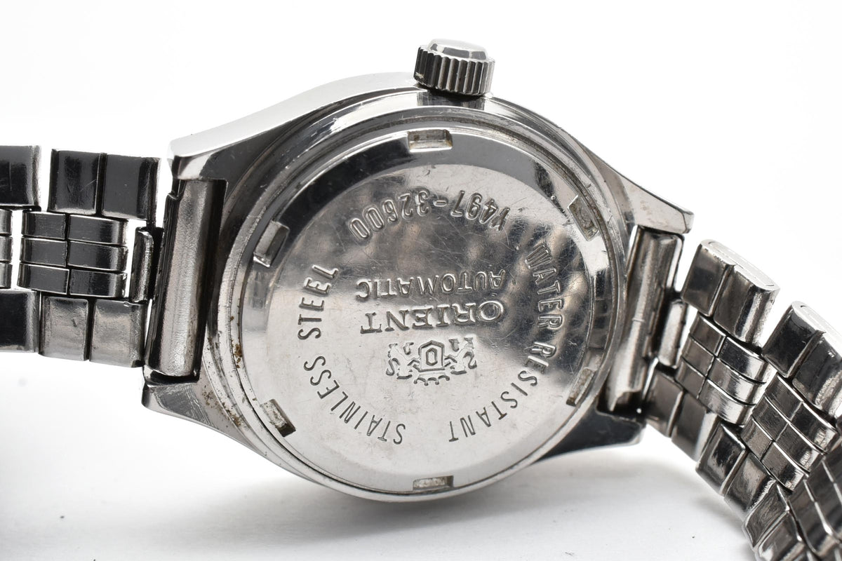 ORIENT オリエント Y497-32600 レディース 自動巻き 腕時計 ブルー文字盤 バーインデックス ステンレス ブレスレット クッションケース 23mm 1970年代 ヴィンテージ