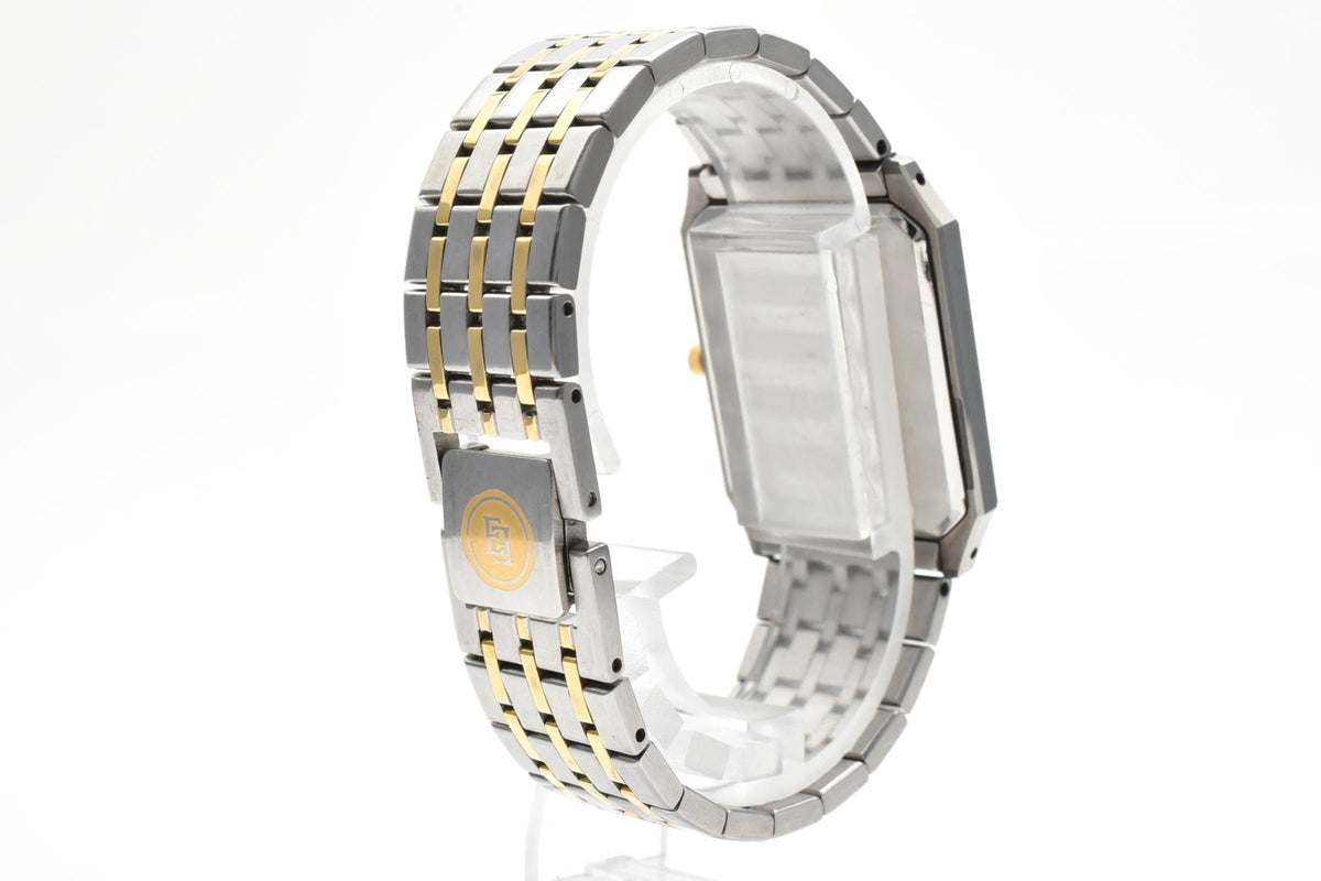 CITIZEN シチズン EXCEED エクシード 5777-F70264 メンズ クォーツ 腕時計 シルバー文字盤 デイト ローマ数字 長方形 ステンレス コンビ ブレスレット 26.5mm 1980年代 ヴィンテージ