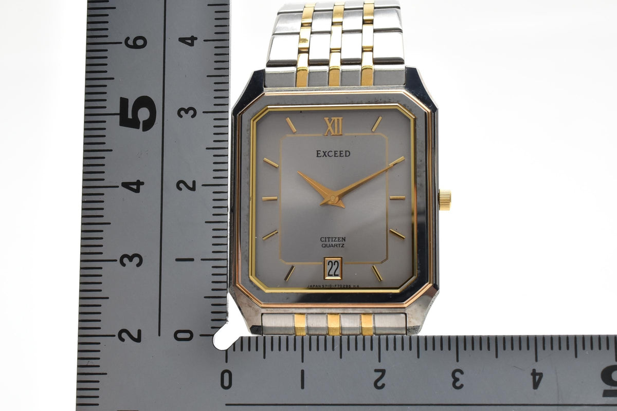 CITIZEN シチズン EXCEED エクシード 5777-F70264 メンズ クォーツ 腕時計 シルバー文字盤 デイト ローマ数字 長方形 ステンレス コンビ ブレスレット 26.5mm 1980年代 ヴィンテージ