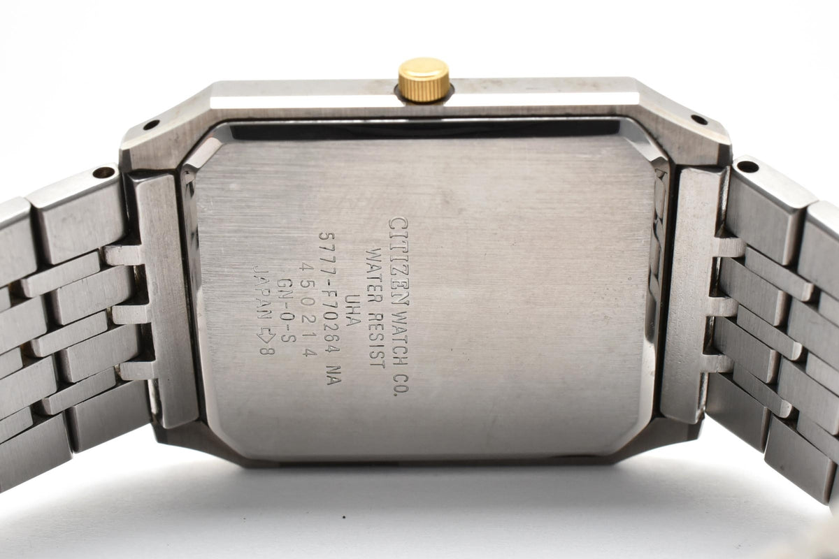 CITIZEN シチズン EXCEED エクシード 5777-F70264 メンズ クォーツ 腕時計 シルバー文字盤 デイト ローマ数字 長方形 ステンレス コンビ ブレスレット 26.5mm 1980年代 ヴィンテージ