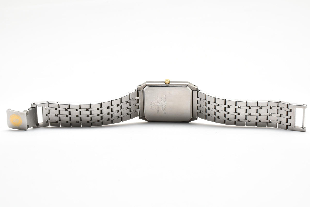 CITIZEN シチズン EXCEED エクシード 5777-F70264 メンズ クォーツ 腕時計 シルバー文字盤 デイト ローマ数字 長方形 ステンレス コンビ ブレスレット 26.5mm 1980年代 ヴィンテージ