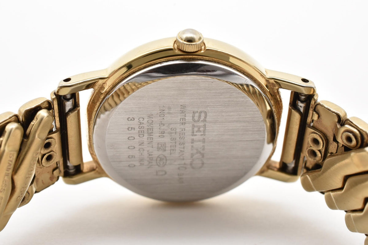 SEIKO セイコー Spirit スピリット 1N01-0JR0 レディース クォーツ 腕時計 クリーム文字盤 アラビア数字 ゴールドカラー ステンレス 伸縮ブレスレット 22mm 2000年代