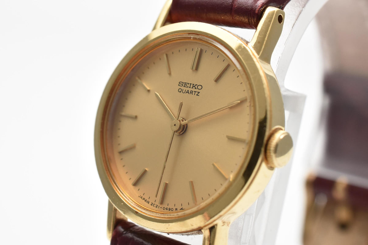 SEIKO セイコー 2C21-D130 レディース クォーツ 腕時計 ゴールド文字盤 ステンレス ラウンドケース ブラウン レザーストラップ 20mm 1980年代 ヴィンテージ