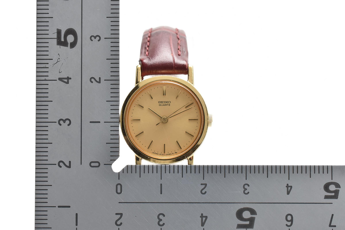 SEIKO セイコー 2C21-D130 レディース クォーツ 腕時計 ゴールド文字盤 ステンレス ラウンドケース ブラウン レザーストラップ 20mm 1980年代 ヴィンテージ