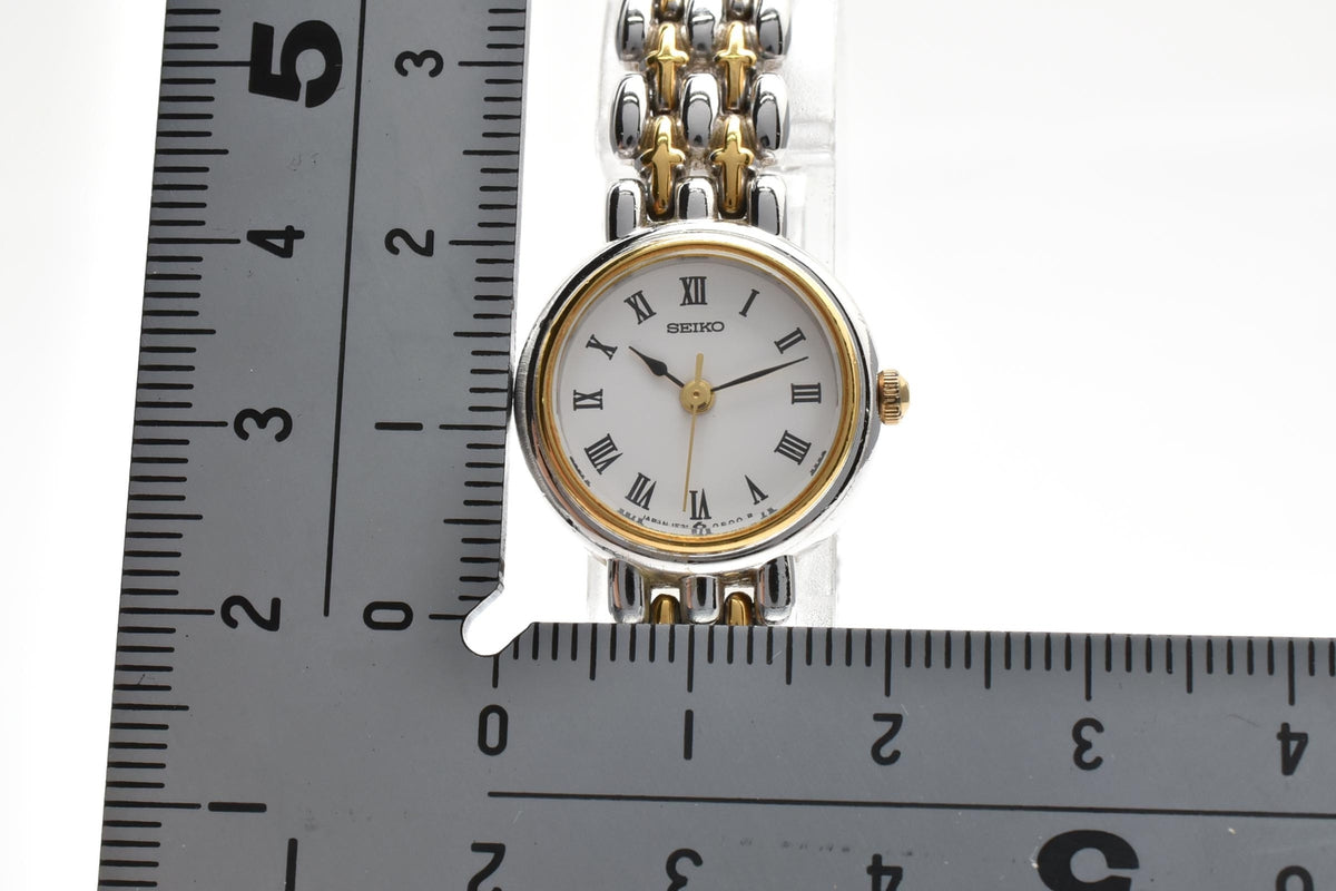 SEIKO セイコー 1F21-0A30 レディース クォーツ 腕時計 ホワイト文字盤 ローマ数字 ゴールド シルバー ツートーン ステンレス ブレスレット 18.2mm 1990年代