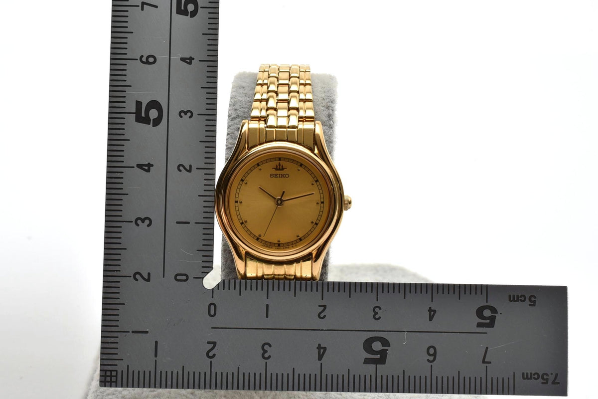 美品 SEIKO セイコー V401-1600 クォーツ ゴールドカラー ラウンド ゴールド文字盤 一体型ブレスレット ヴィンテージ レディース 腕時計 稼働品