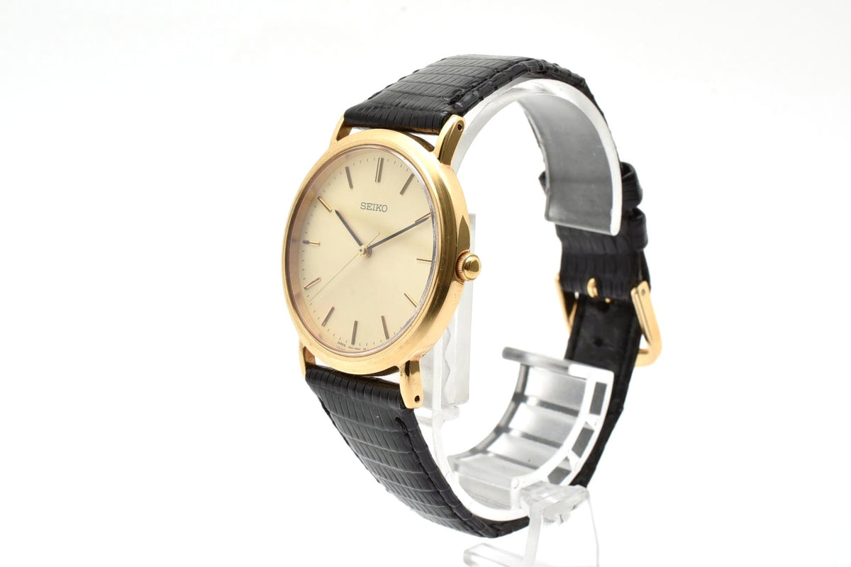 美品 SEIKO セイコー 7N01-0BH0 クォーツ 薄型 ゴールドカラー シャンパン文字盤 レザーベルト 記念刻印 1990年代 メンズ 腕時計 稼働品