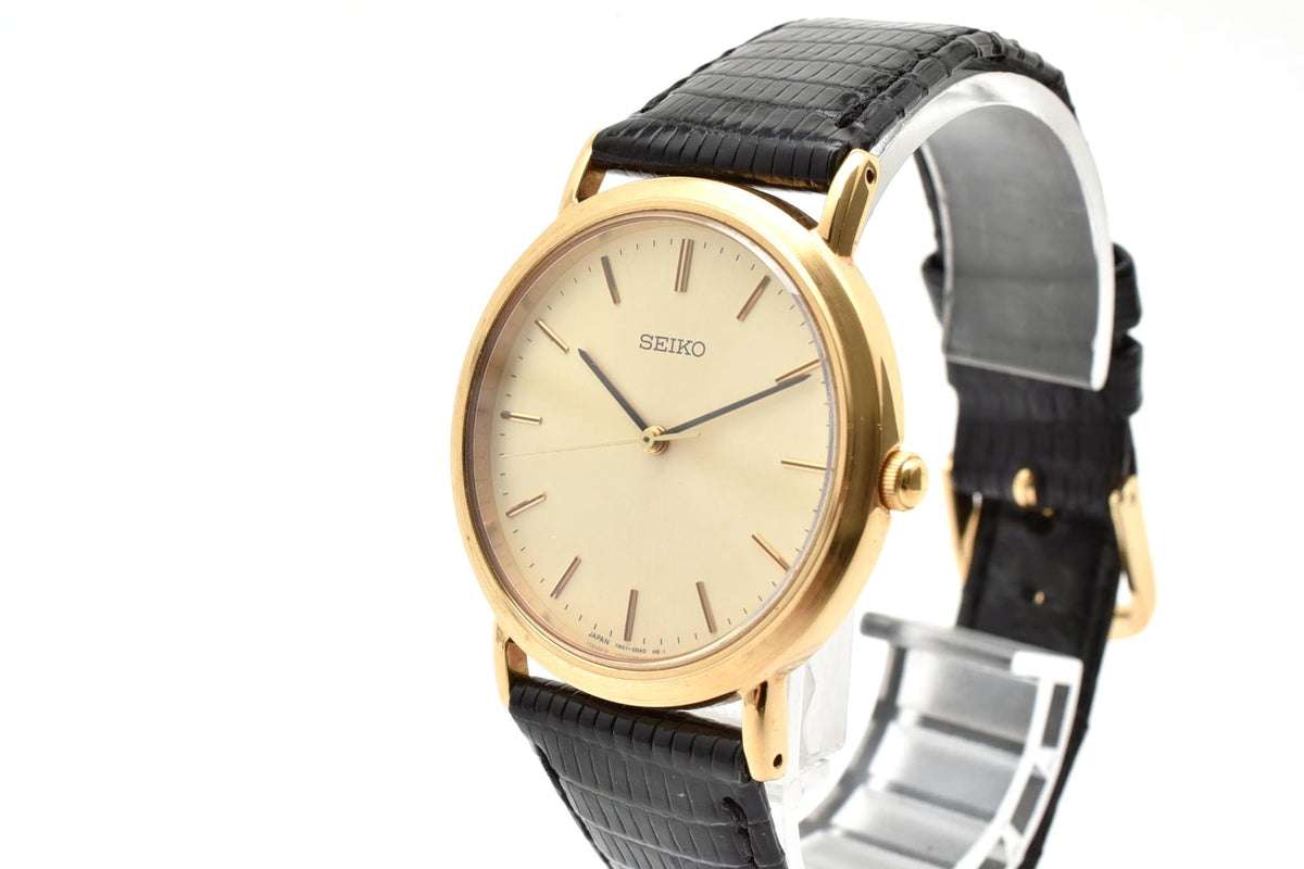 美品 SEIKO セイコー 7N01-0BH0 クォーツ 薄型 ゴールドカラー シャンパン文字盤 レザーベルト 記念刻印 1990年代 メンズ 腕時計 稼働品
