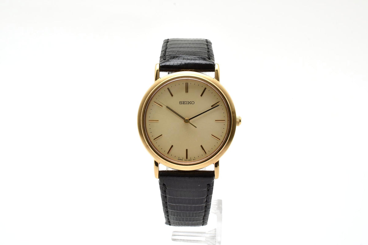 美品 SEIKO セイコー 7N01-0BH0 クォーツ 薄型 ゴールドカラー シャンパン文字盤 レザーベルト 記念刻印 1990年代 メンズ 腕時計 稼働品