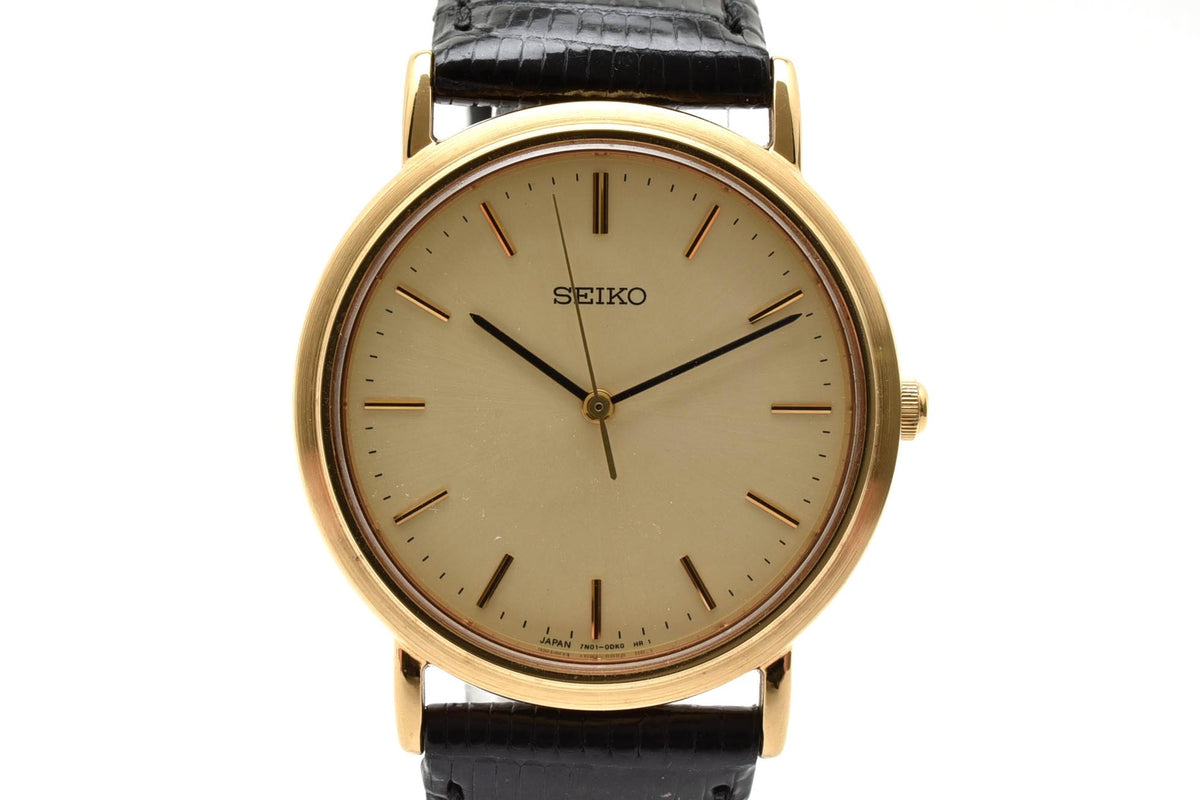 美品 SEIKO セイコー 7N01-0BH0 クォーツ 薄型 ゴールドカラー シャンパン文字盤 レザーベルト 記念刻印 1990年代 メンズ 腕時計 稼働品