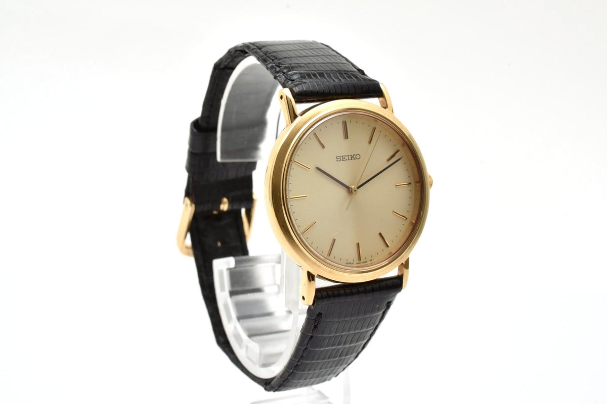 美品 SEIKO セイコー 7N01-0BH0 クォーツ 薄型 ゴールドカラー シャンパン文字盤 レザーベルト 記念刻印 1990年代 メンズ 腕時計 稼働品