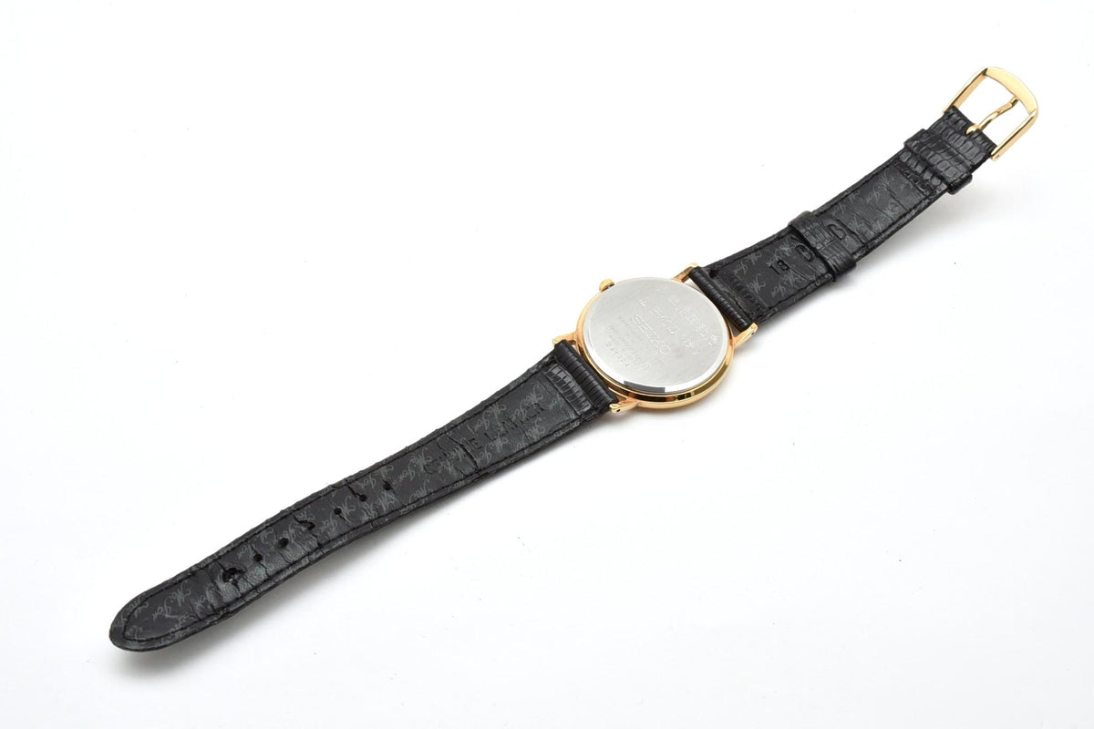 美品 SEIKO セイコー 7N01-0BH0 クォーツ 薄型 ゴールドカラー シャンパン文字盤 レザーベルト 記念刻印 1990年代 メンズ 腕時計 稼働品