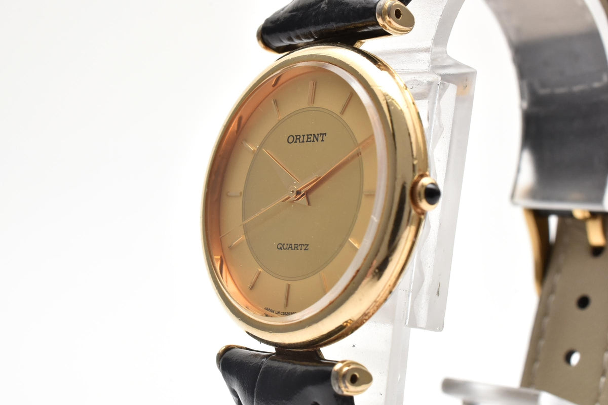 美品 ORIENT オリエント C25536-00 クォーツ 薄型 ドレスウォッチ ゴールド文字盤 金メッキ レザーベルト 日本製 ユニセックス 腕時計 稼働品