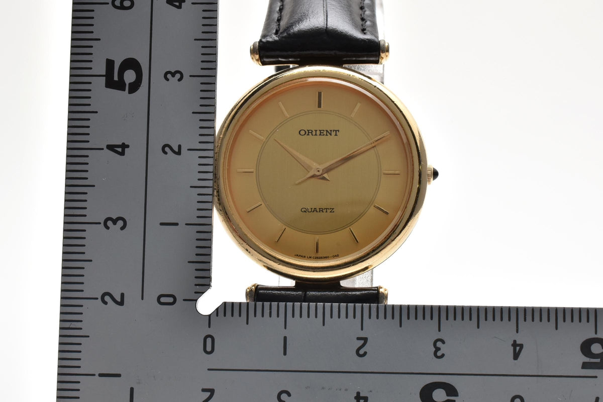 美品 ORIENT オリエント C25536-00 クォーツ 薄型 ドレスウォッチ ゴールド文字盤 金メッキ レザーベルト 日本製 ユニセックス 腕時計 稼働品