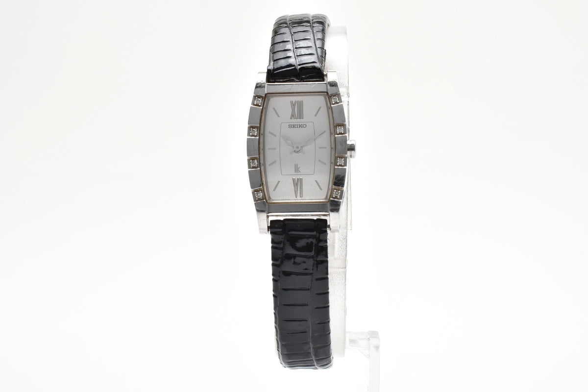 美品 SEIKO LUKIA セイコー ルキア 1F20-0BK0 クォーツ トノー型 ラインストーンベゼル ホワイト文字盤 レザーベルト 10気圧防水 レディース 腕時計 稼働品