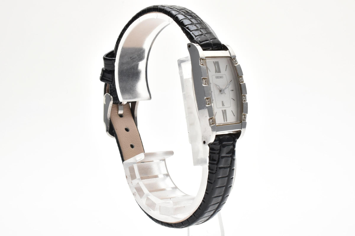 美品 SEIKO LUKIA セイコー ルキア 1F20-0BK0 クォーツ トノー型 ラインストーンベゼル ホワイト文字盤 レザーベルト 10気圧防水 レディース 腕時計 稼働品