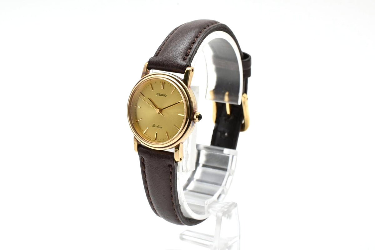 美品 SEIKO セイコー エクセリーヌ 4N21-0180 クォーツ ゴールドカラー シャンパン文字盤 レザーベルト 記念刻印 1990年代 レディース 腕時計 稼働品