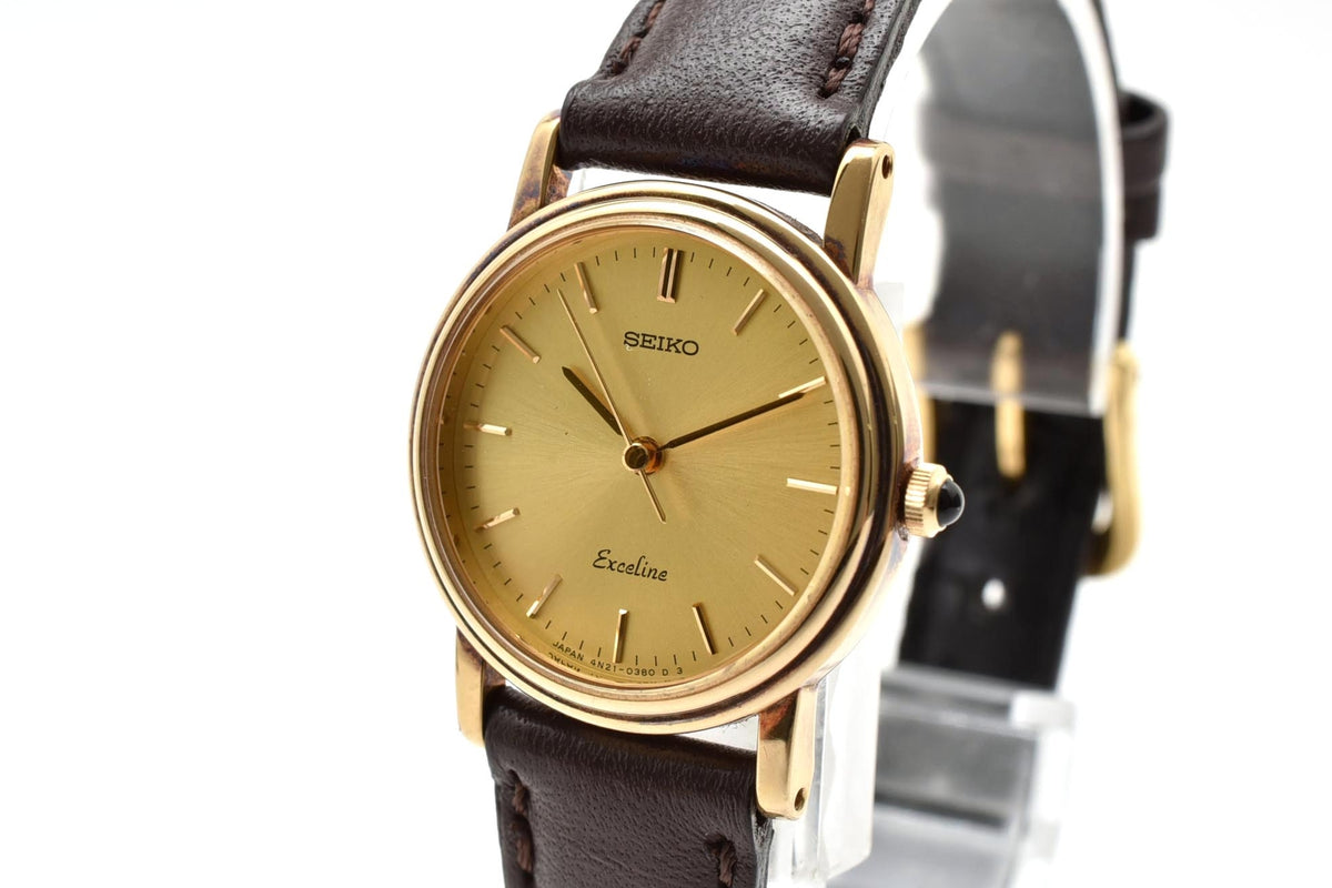 美品 SEIKO セイコー エクセリーヌ 4N21-0180 クォーツ ゴールドカラー シャンパン文字盤 レザーベルト 記念刻印 1990年代 レディース 腕時計 稼働品