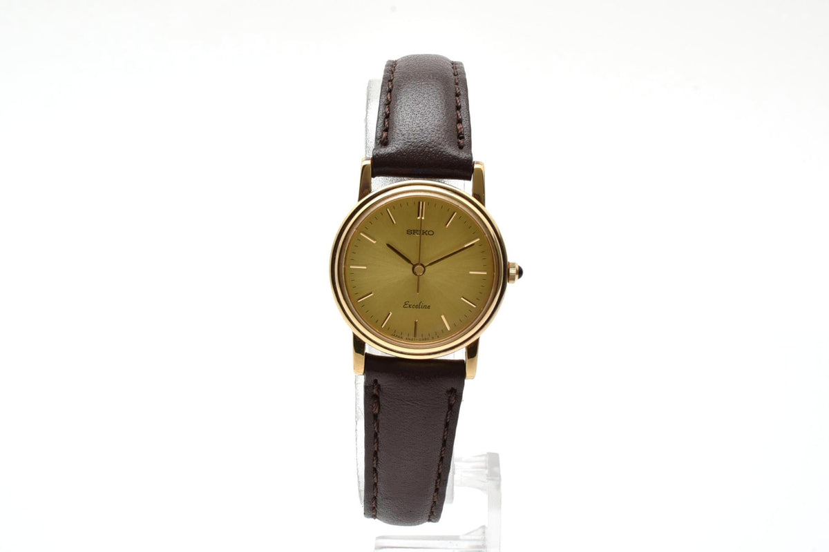 美品 SEIKO セイコー エクセリーヌ 4N21-0180 クォーツ ゴールドカラー シャンパン文字盤 レザーベルト 記念刻印 1990年代 レディース 腕時計 稼働品