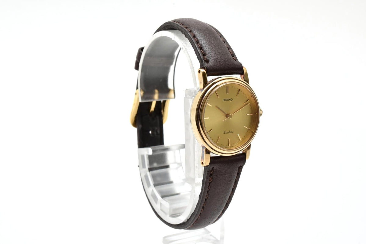 美品 SEIKO セイコー エクセリーヌ 4N21-0180 クォーツ ゴールドカラー シャンパン文字盤 レザーベルト 記念刻印 1990年代 レディース 腕時計 稼働品