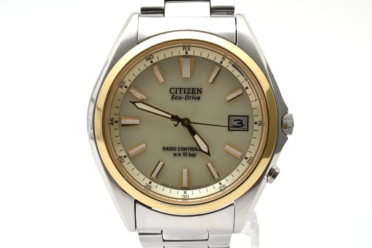 美品 CITIZEN シチズン エコドライブ 電波 H415-S038294 ソーラー デイト ステンレス ゴールドベゼル コンビ アイボリー文字盤 10気圧防水 メンズ 腕時計 稼働品