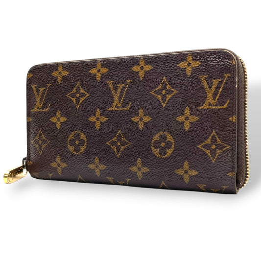 ルイ・ヴィトン LOUIS VUITTON モノグラム ジッピーウォレット 長財布 ラウンドファスナー PVC レザー ブラウン 茶 ゴールド金具 メンズ レディース ユニセックス 定番 人気 収納力抜群 エレガント 上品 普段使い W5