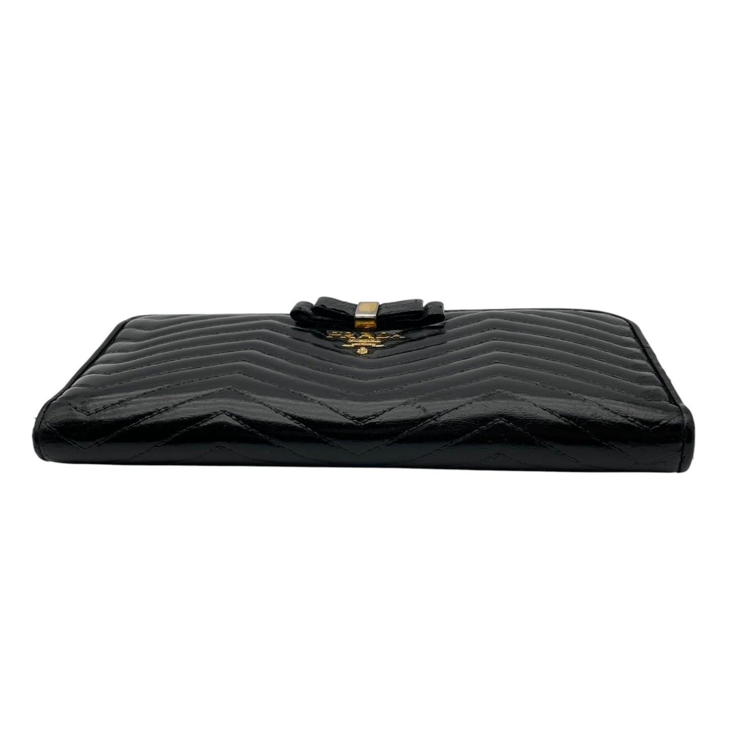 【良品】 プラダ PRADA 長財布 L字ファスナー キルティング V字ステッチ リボン メタルロゴ ナッパレザー 本革 ブラック 黒 ゴールド金具 レディース エレガント 上品 高級感 可愛い 普段使い 収納力 整理整頓 定番 人気 W5
