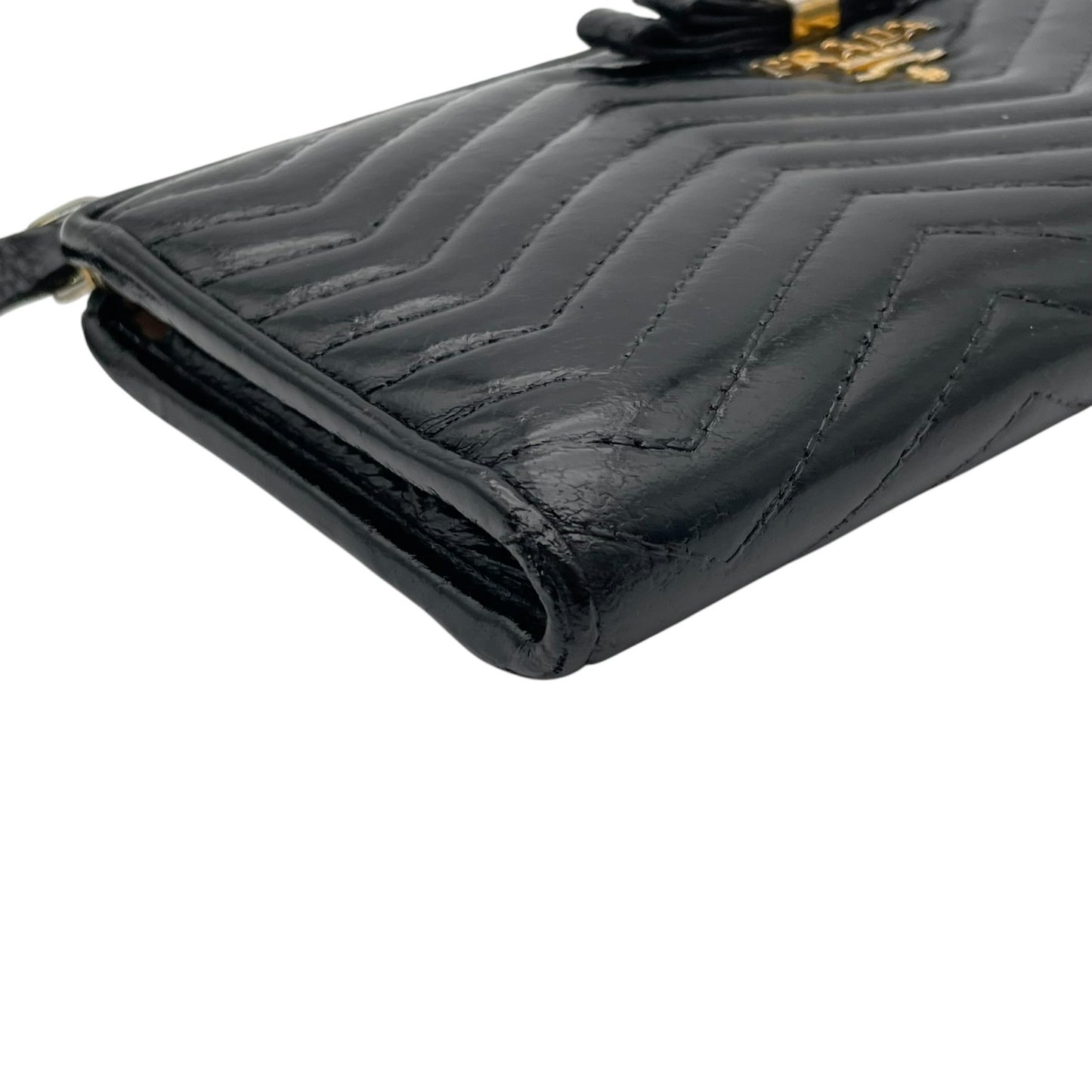 【良品】 プラダ PRADA 長財布 L字ファスナー キルティング V字ステッチ リボン メタルロゴ ナッパレザー 本革 ブラック 黒 ゴールド金具 レディース エレガント 上品 高級感 可愛い 普段使い 収納力 整理整頓 定番 人気 W5