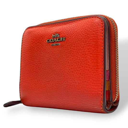 コーチ COACH 二つ折り財布 コンパクトウォレット ラウンドファスナー ジップアラウンド レザー 本革 オレンジ ゴールド金具 レディース ロゴ 馬車 エレガント クラシック m2