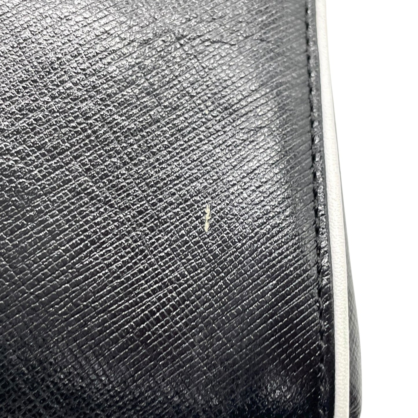 ジバンシィ Givenchy ジバンシー ロゴ金具 クラッチバッグ バイカラー 黒 ブラック 白 ホワイト レザー タッセル フリンジ ヴィンテージ S96