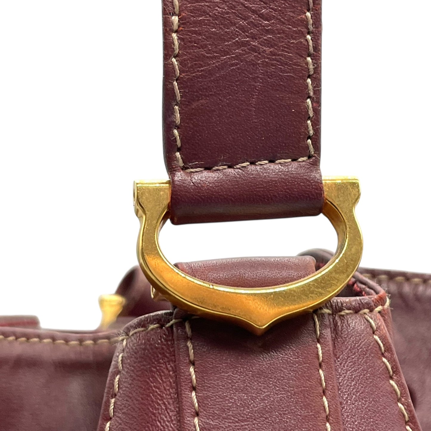 美品 Cartier カルティエ マストライン 巾着型 ショルダーバッグ 赤 ボルドー ワインレッド レザー ゴールド金具 ロゴ 2Cモチーフ 斜め掛け可 レディース ギャランティカード付き K12