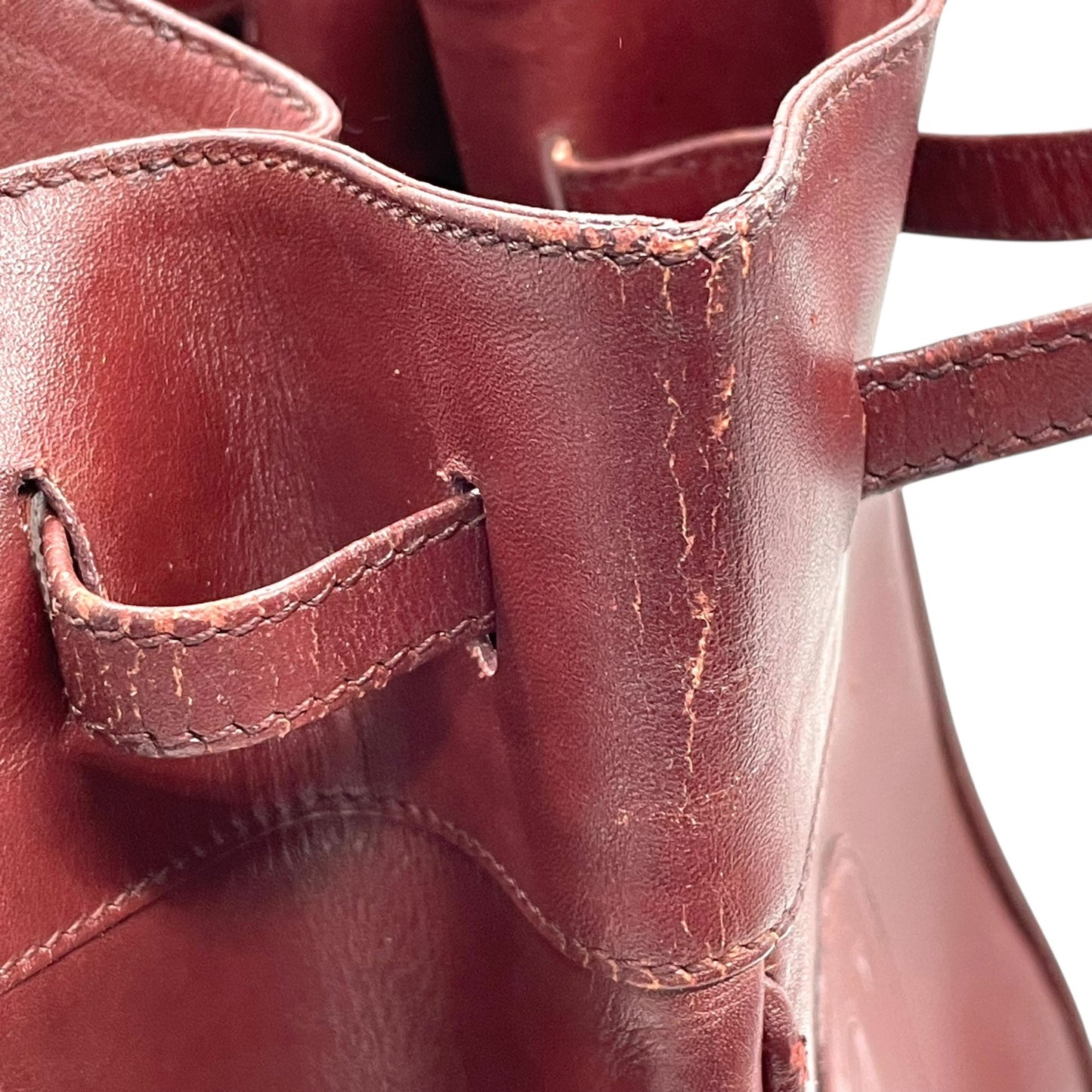 カルティエ マストライン ショルダーバッグ 巾着型 ボルドー ワインレッド レザー ゴールド金具 ロゴ型押し ヴィンテージ レディース A8