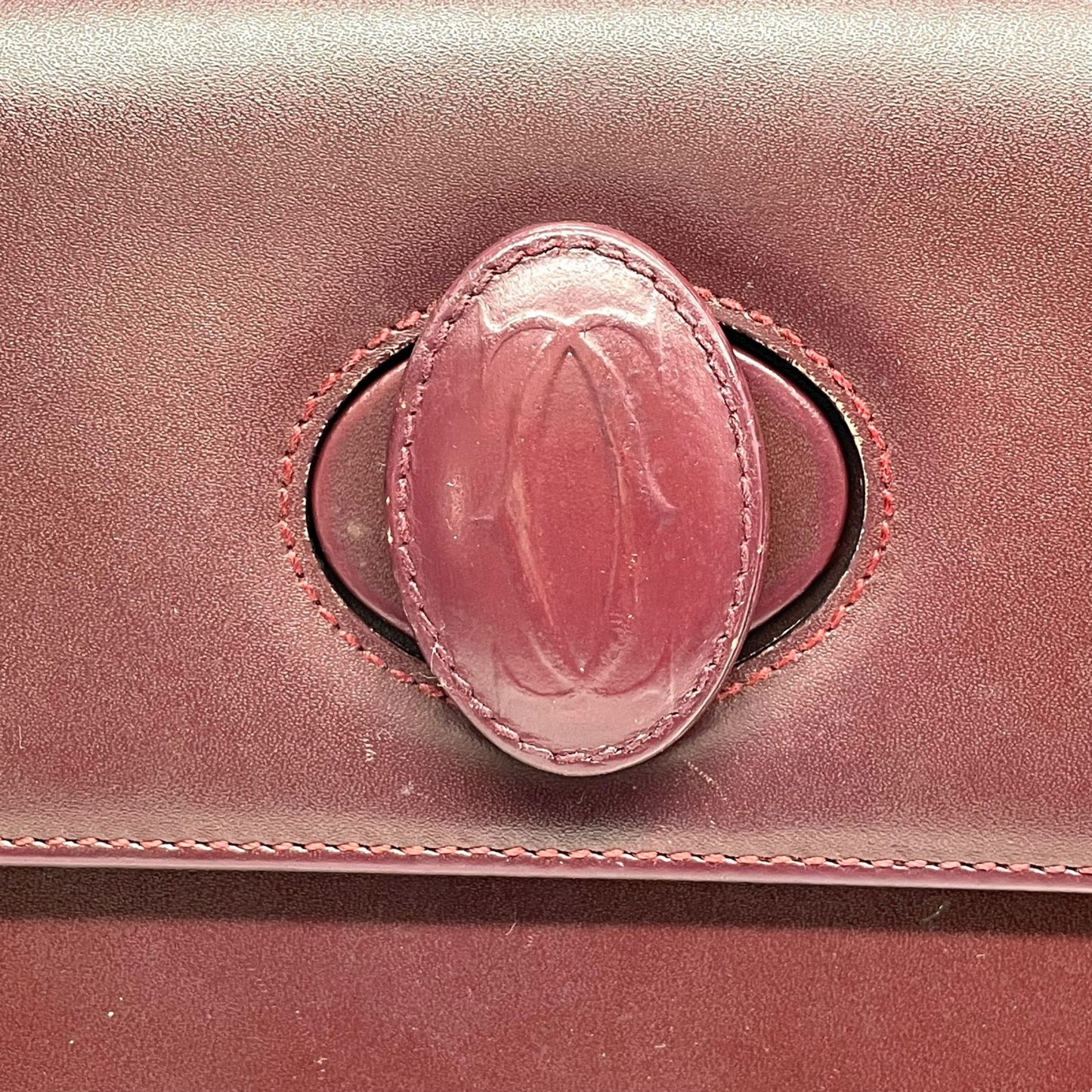 カルティエ マストライン ハンドバッグ ワンショルダー 自立可 ターンロック 2Cロゴ Cロゴ レザー 本革 ボルドー ワインレッド レディース ヴィンテージ クラシック エレガント フォーマル パーティバッグ 高級感 G