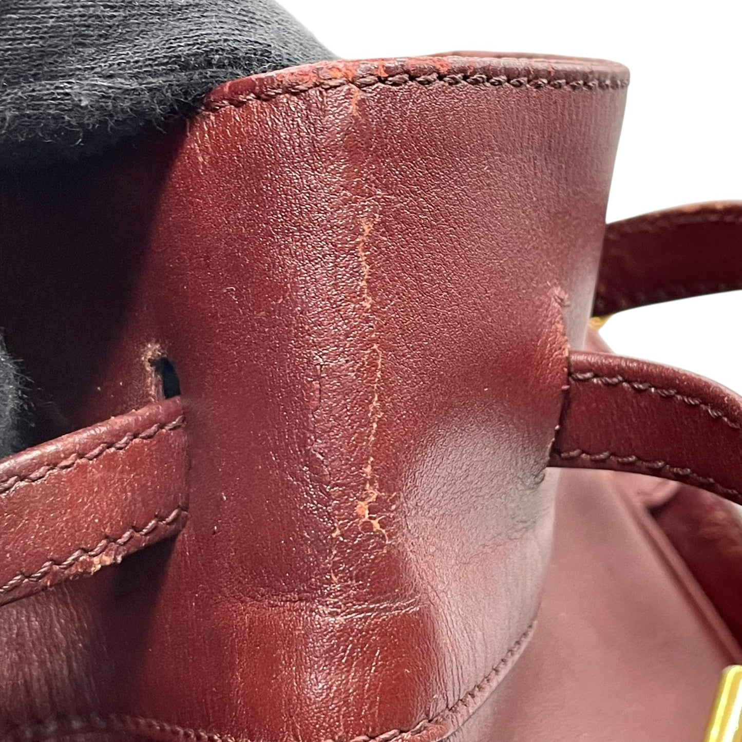 カルティエ マストライン ショルダーバッグ 巾着型 ボルドー ワインレッド レザー ゴールド金具 ロゴ型押し ヴィンテージ レディース A8