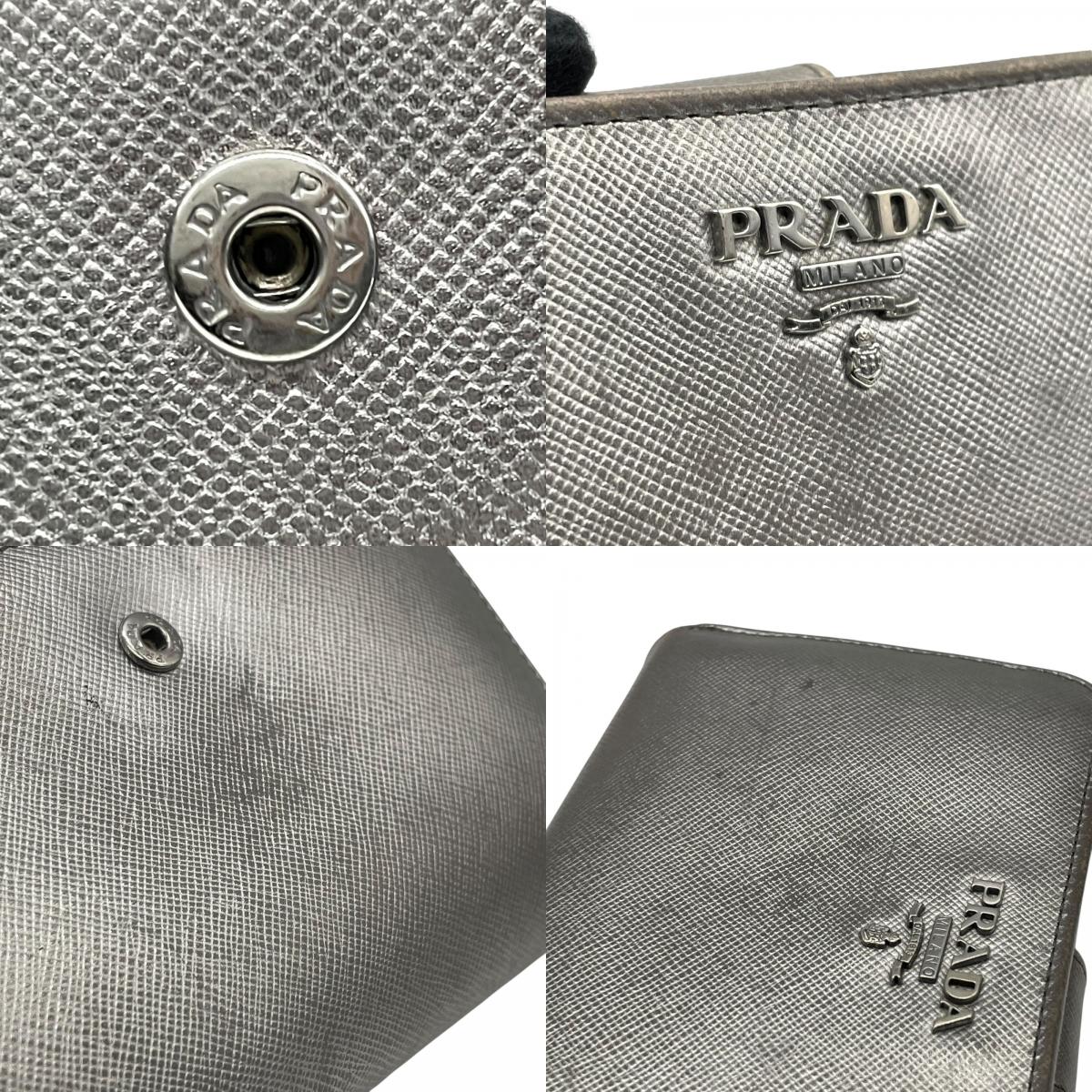 PRADA プラダ 二つ折り財布 コンパクトウォレット メタリックシルバー サフィアーノレザー ロゴ シルバー金具 L字ファスナー レディース W3