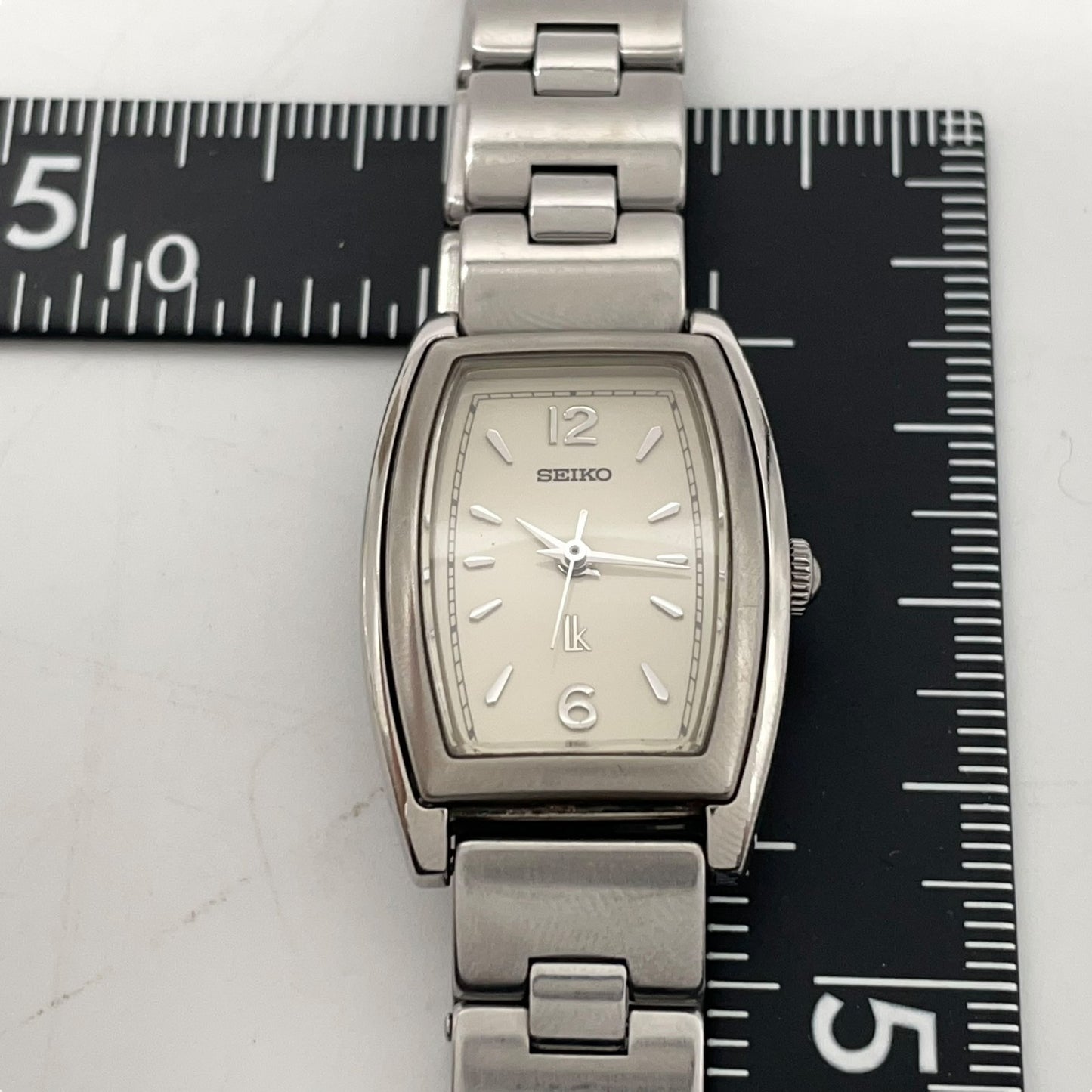 【稼働品】セイコー SEIKO ルキア LUKIA 腕時計 ウォッチ 1F21-5D30 レディース クオーツ トノー 樽型 アナログ エレガント ドレスウォッチ アイボリー文字盤 シルバー ステンレススチール製 ビジネスシーン クリーニング済み G