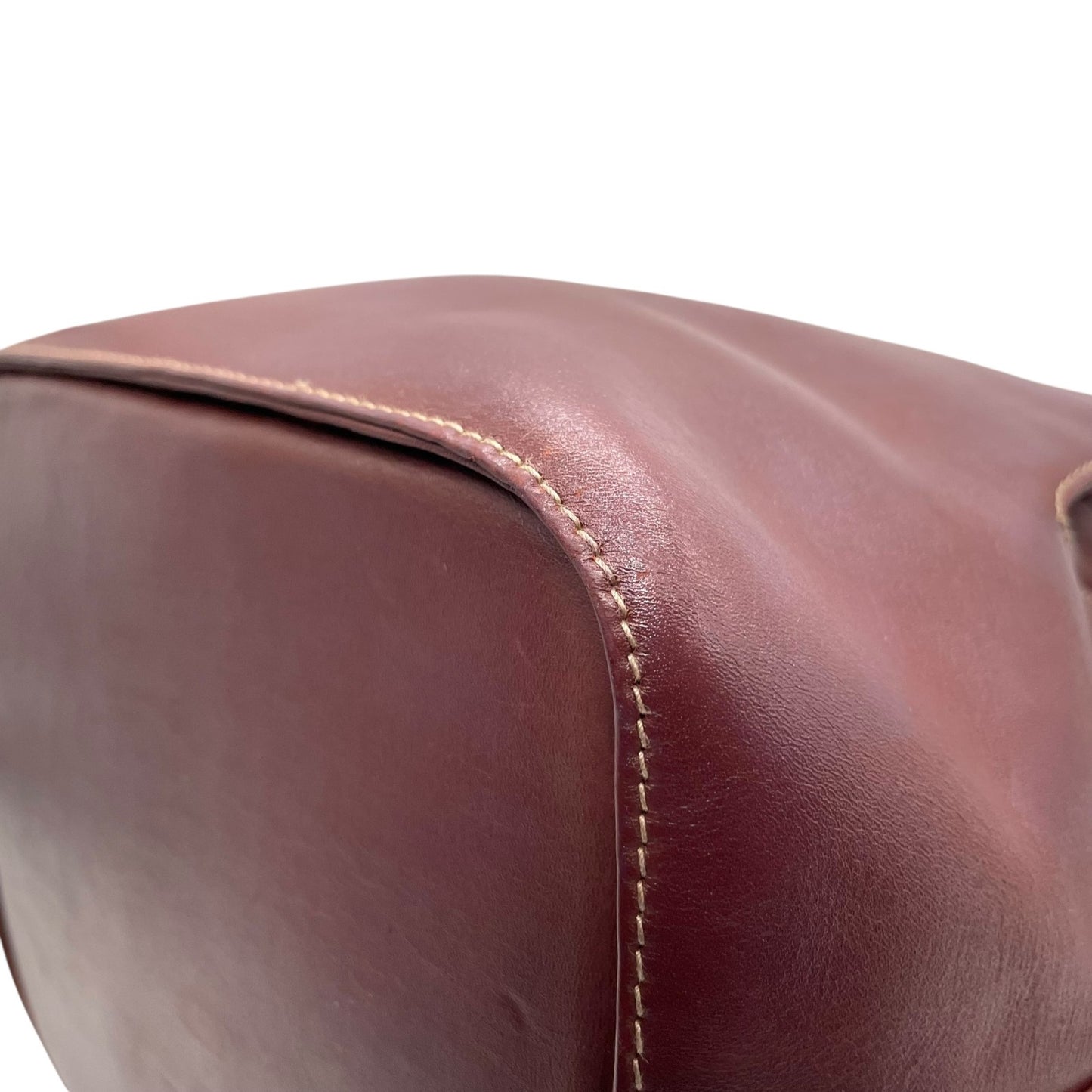 美品 Cartier カルティエ マストライン 巾着型 ショルダーバッグ 赤 ボルドー ワインレッド レザー ゴールド金具 ロゴ 2Cモチーフ 斜め掛け可 レディース ギャランティカード付き K12