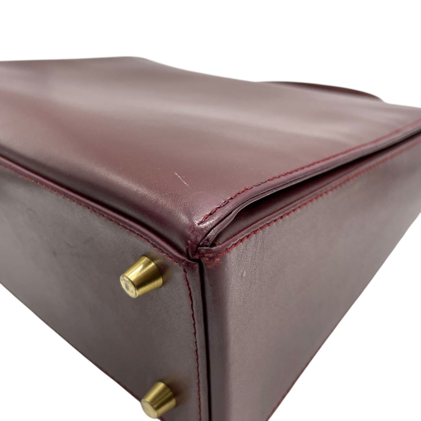 カルティエ マストライン ハンドバッグ ワンショルダー 自立可 ターンロック 2Cロゴ Cロゴ レザー 本革 ボルドー ワインレッド レディース ヴィンテージ クラシック エレガント フォーマル パーティバッグ 高級感 G