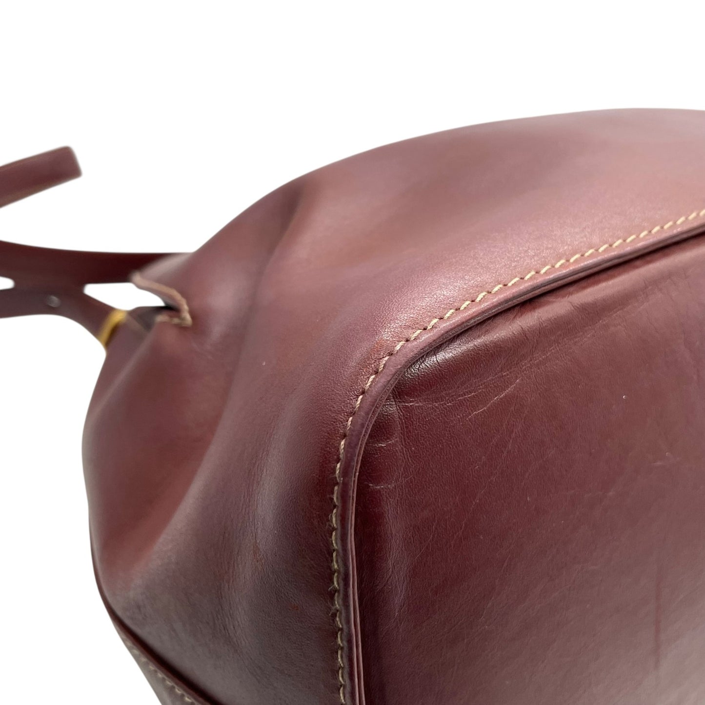 美品 Cartier カルティエ マストライン 巾着型 ショルダーバッグ 赤 ボルドー ワインレッド レザー ゴールド金具 ロゴ 2Cモチーフ 斜め掛け可 レディース ギャランティカード付き K12