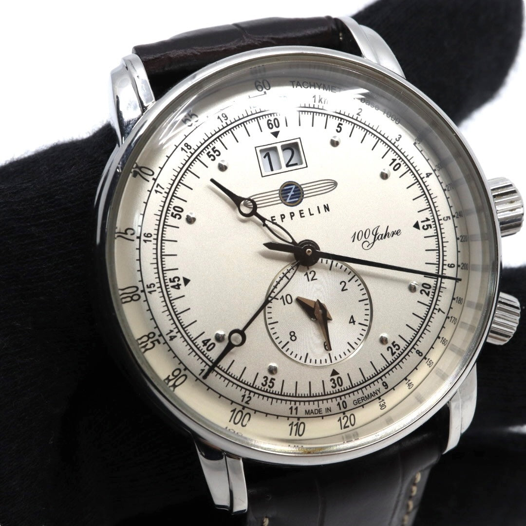 【極美品/電池交換済】 ZEPPELIN ツェッペリン 100周年記念モデル 7640-1 腕時計 メンズ クロノグラフ ビッグデイト アイボリー文字盤 ブラウンレザー ドイツ製 パイロットウォッチ クラシック エレガント アナログ クォーツ 稼働品 G2