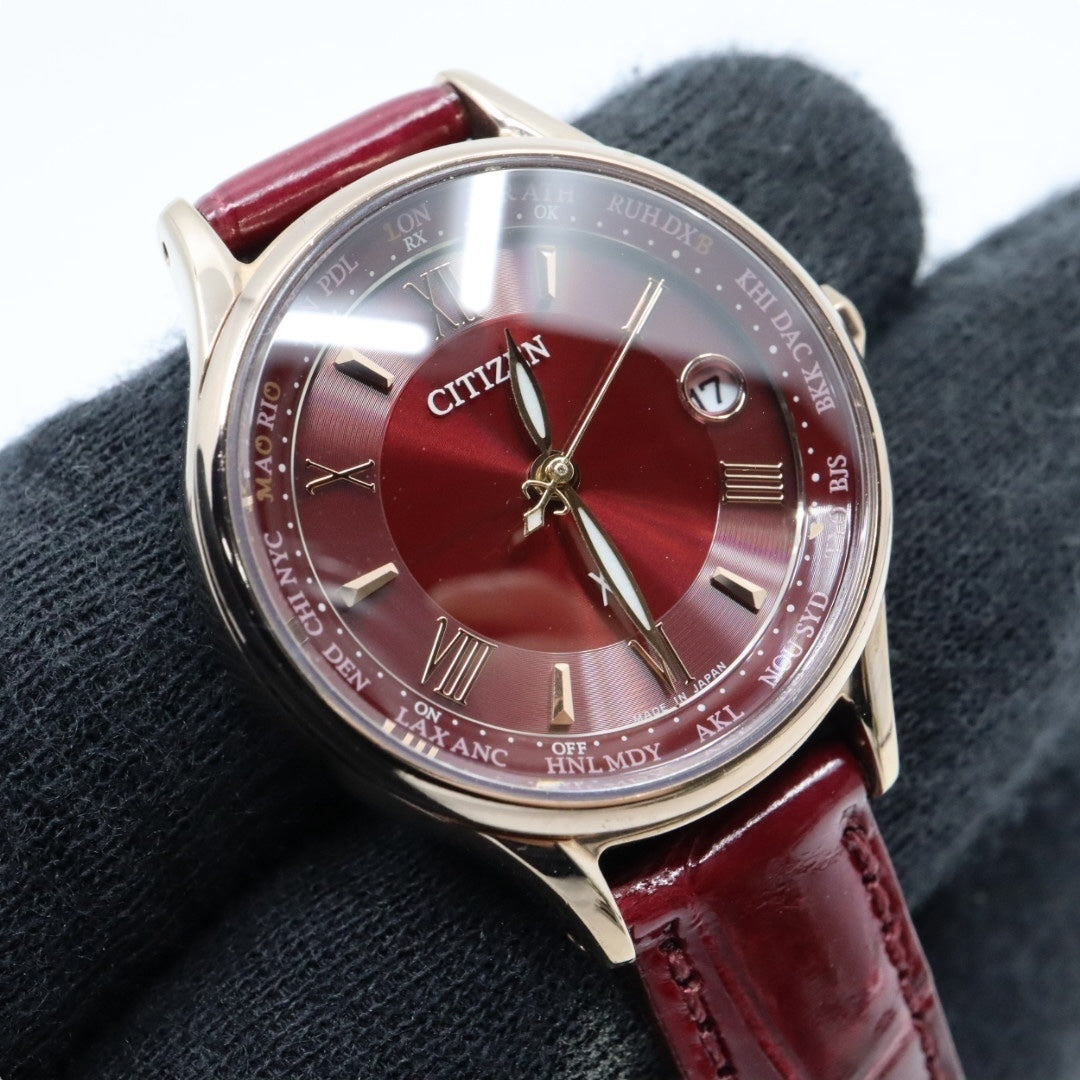 【美品】シチズン xC クロスシー 腕時計 エコドライブ電波時計 H246 チタン ローズゴールド レッド サンバースト レザーベルト レディース G4